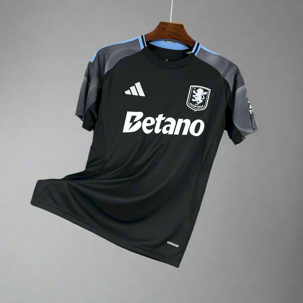 Black sports jersey with Adidas and Betano logos on a hanger against a wire mesh background