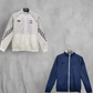 P@ris Saint Germ@in Reverse Windbreaker 24/25 Jordan Wings