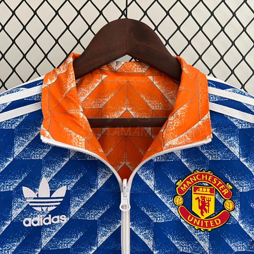 Manchester United Reversible Orange/Blue Windbreaker 23/24